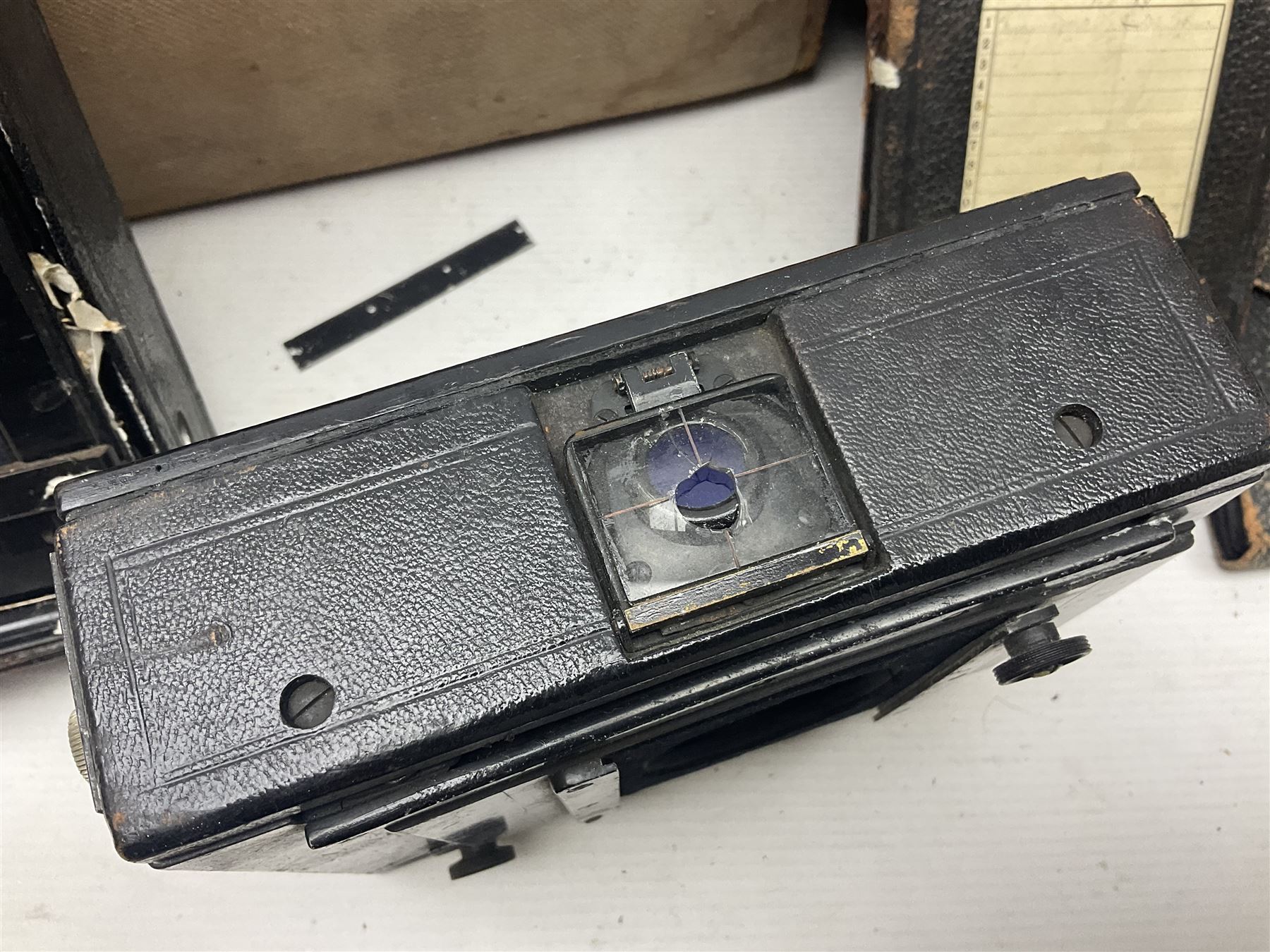 Contessa-Camera Werke folding camera, together with Hirrlinger folding camera, additional plates, two tripods and other accessories 