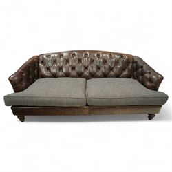 Tetrad - Harris Tweed and leather upholstered Chesterfield sofa, curved back and arms  with deep buttoned brown leather upholstery above loose herringbone tweed seat cushions with brown leather piping, raised on turned wooden feet 