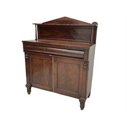 Early 19th century mahogany chiffonier side cabinet, the raised arched back with open shelf over cushion frieze drawer and two panelled cupboards, raised on turned supports