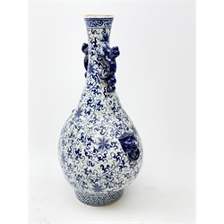 Large blue and white vase of tapering form with crackle glaze body, with lion mask and Dog of Fo moulded handles, H54cm.
