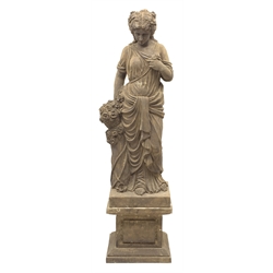 Carved stone figure of a woman with a bouquet of roses on square stepped plinth, H160cm