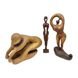 Helen Skelton (British 1933 – 2023): Three carved wooden abstract sculptures, each modelled as a a figure, tallest H52cm. Born into an RAF family in 1933 in Kent and travelled the world extensively during her childhood. After settling in Bridlington, Helen immersed herself in painting, textiles, and wood sculpture, often inspired by nature's beauty. Her talent was showcased in a one-woman show at Sewerby Hall and recognised with the sculpture prize at Ferens Art Gallery in 2000. Sadly, Helen’s daughter passed away from cancer in 2005. This loss inspired Helen to donate her sculptures to Marie Curie upon her passing in 2023.