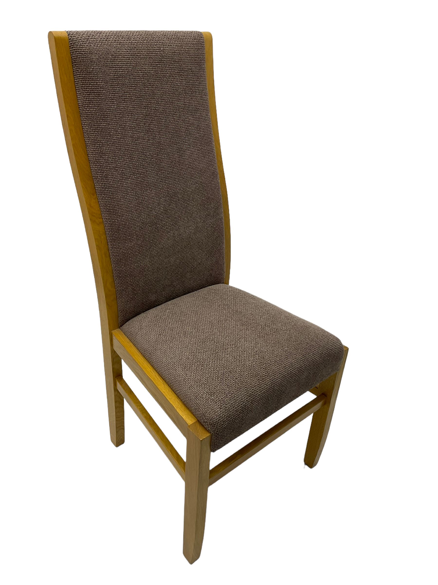 Large pippy oak rectangular dining table, square block leg, and six high back upholstered chairs, retailed by Chapmans of Newcastle