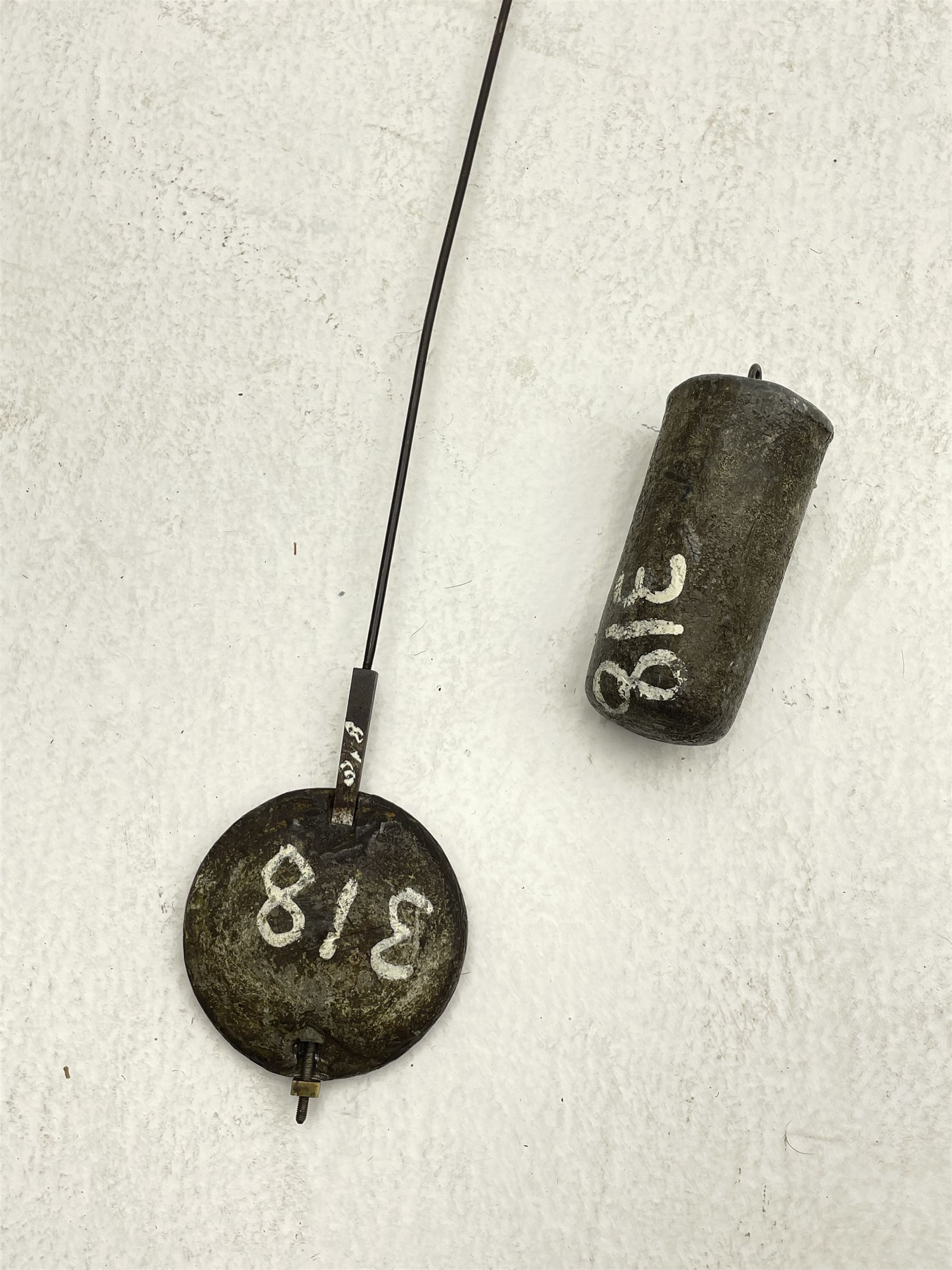 Early 19th century oak and rosewood banded longcase clock, scrolled pediment over stepped arch hood door, enamel painted dial indistinctly signed for a Penrith maker, 30-hour movement striking on bell
