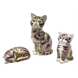 Three Royal Crown Derby  Imari pattern paperweights, comprising seated kitten and sleeping kitten, both with gold stoppers and large seated cat with silver stopper