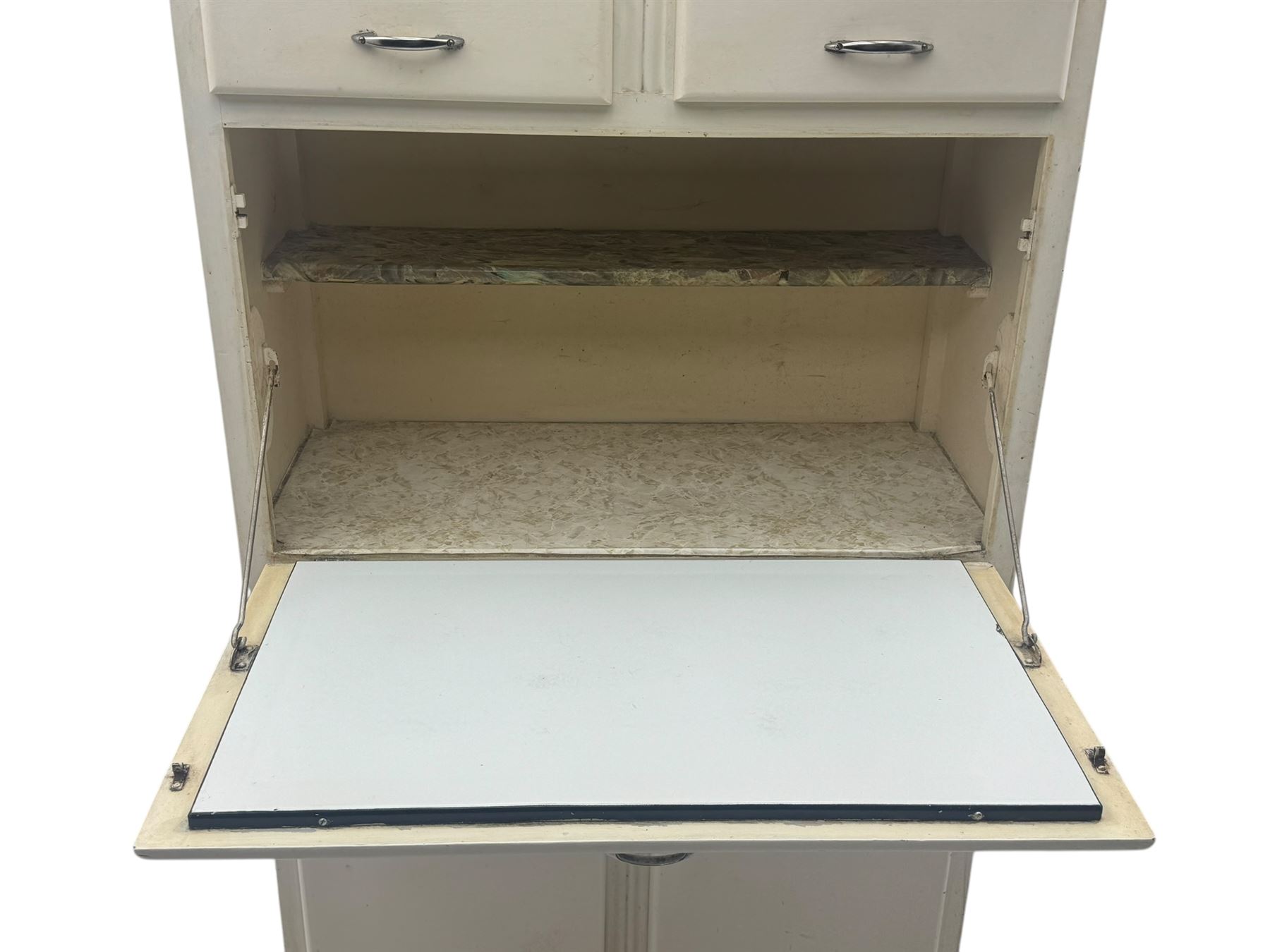 Mid-20th century painted kitchen cabinet, moulded top above a pair of glazed cupboard doors with stylised arrow motif panels, over two drawers and a fall-front cupboard, the lower section with twin cupboard doors
