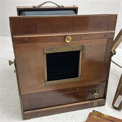 Kieser & Pfeufer folding mahogany and brass full plate camera, with adjustable wooden tripod