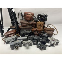 Collection of cameras and lenses, to include Pentax Program A camera body, serial no 123759, with 'Pentax-A zoom 1:3.5-4.5 28-80mm' len, Praktica EE2 camera body with 'Pentacon electric 1.8/50' lens etc, together with a Manfrotto tripod 