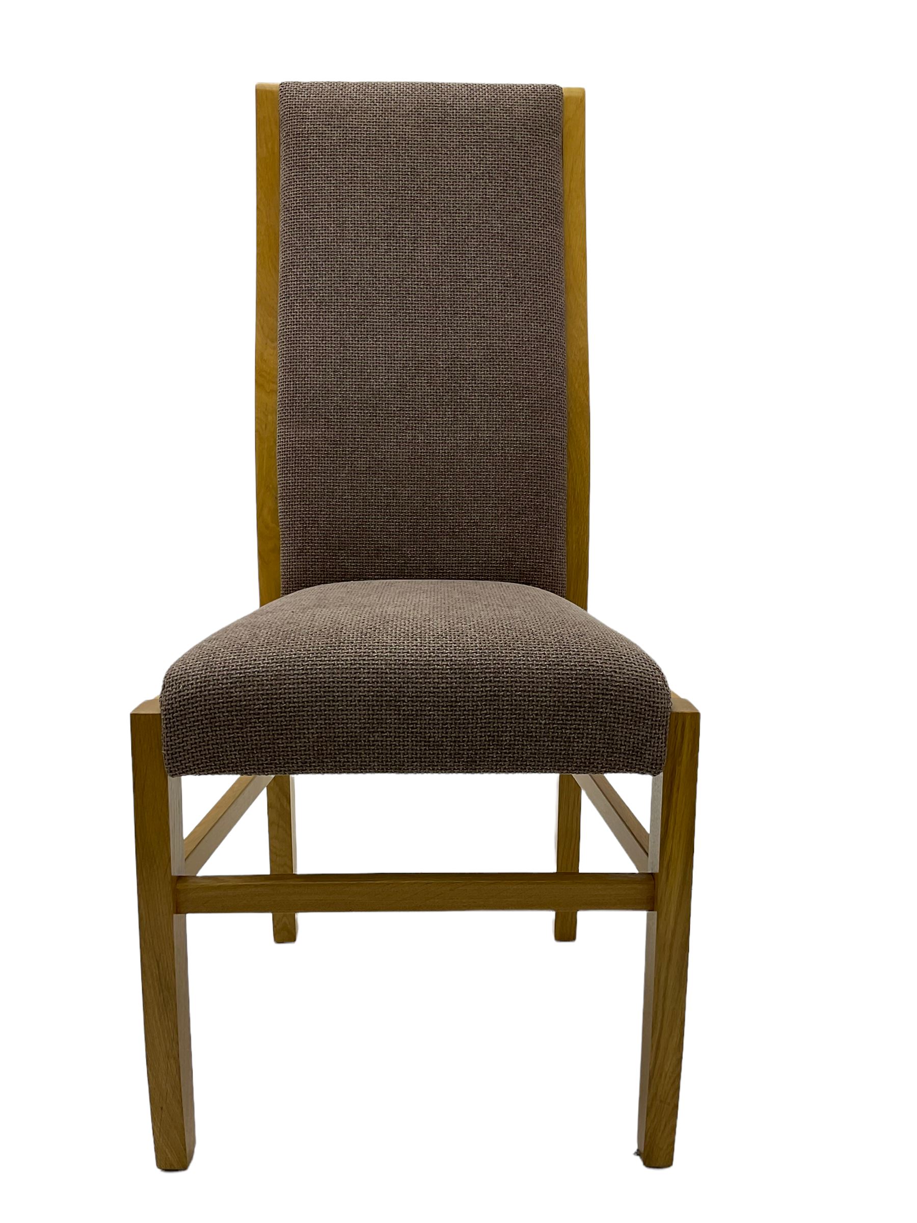 Large pippy oak rectangular dining table, square block leg, and six high back upholstered chairs, retailed by Chapmans of Newcastle