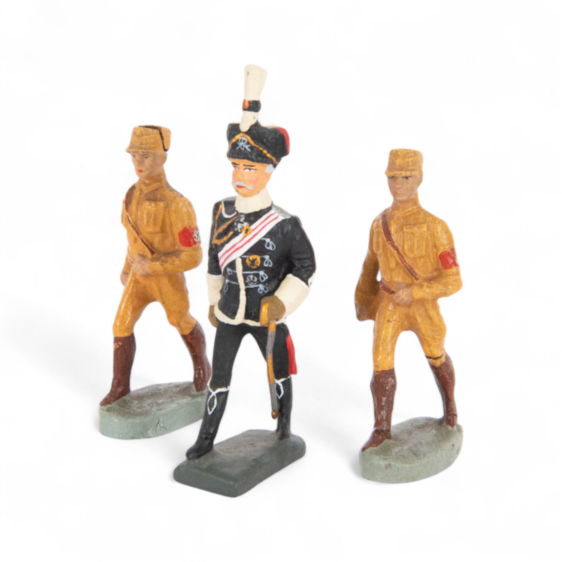 Elastolin; two SA Brownshirts in party uniforms circa 1930's, together with Lineol resin Von Mackensen, circa 1970, marks beneath