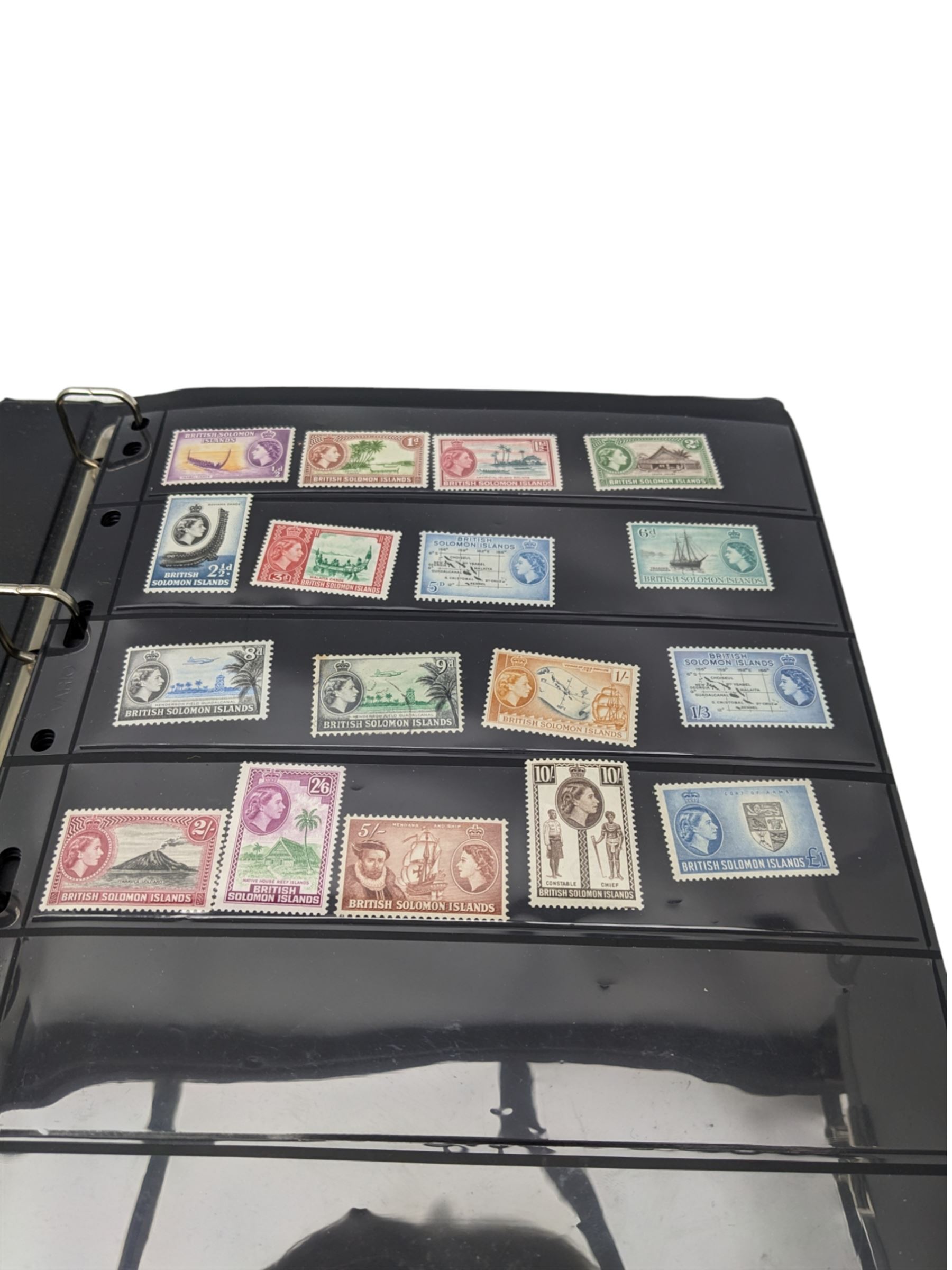 Mostly King George VI and Queen Elizabeth II Commonwealth or Empire stamps, including QEII British Solomon Islands, Pitcairn Islands, Seychelles, Sierra Leone, Mauritius, Guernsey etc, KGVI Turks and Caicos Islands, Falkland Islands Dependencies etc, mixture of mint and used values with some higher values