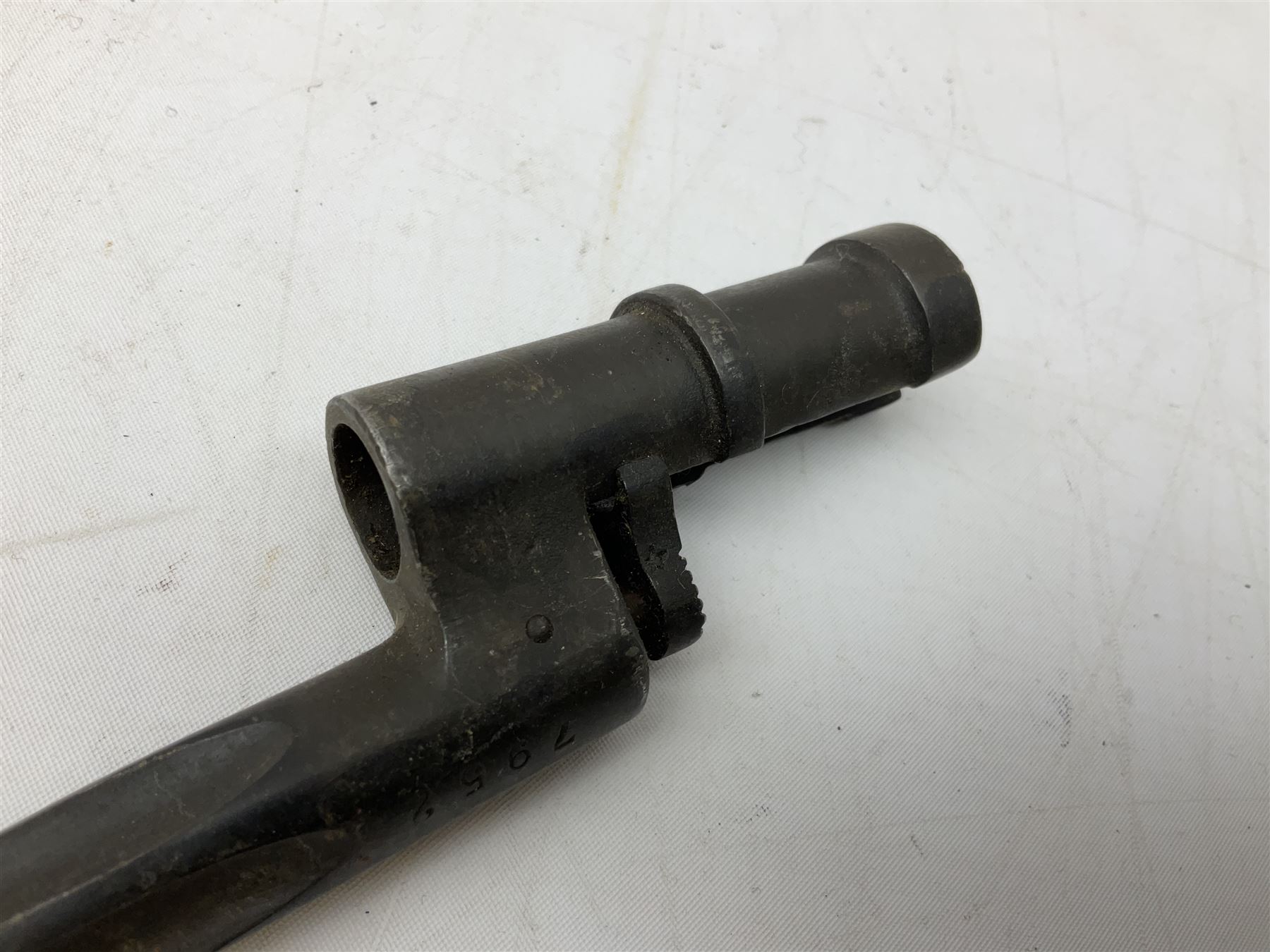 British Pattern 1876 socket bayonet with 43cm steel triangular blade L52cm overall; another socket bayonet with cruciform blade; No.4 Mk.II spike bayonet in metal scabbard with webbing frog; and 1955 Army jack knife by J.H. Thompson Sheffield (4)