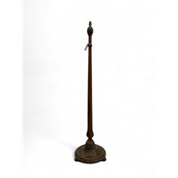 Early 20th century oak standard lamp base, of baluster form with fluted acorn finial and carved foliate decoration to the base, raised on circular plinth with bun feet