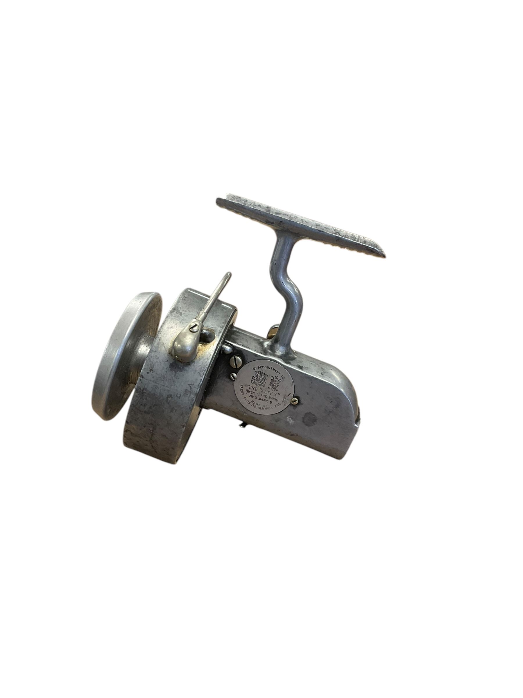 Three fishing reels, comprising Abu Ambassadeur 7000 multiplier, Hardy 'Altex' Fishing Reel and fishing reel measuring marked Mallochs patent & Strand London 