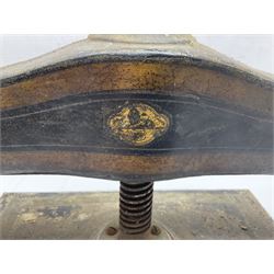 Heavy cast iron Victorian book press with striped gilt decoration, H42cm W50cm