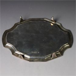 Victorian silver teapot stand, with chippendale style rim and engraved crest to centre, upon four pad feet, hallmarked Thomas Bradbury & Sons, London 1897, W18cm