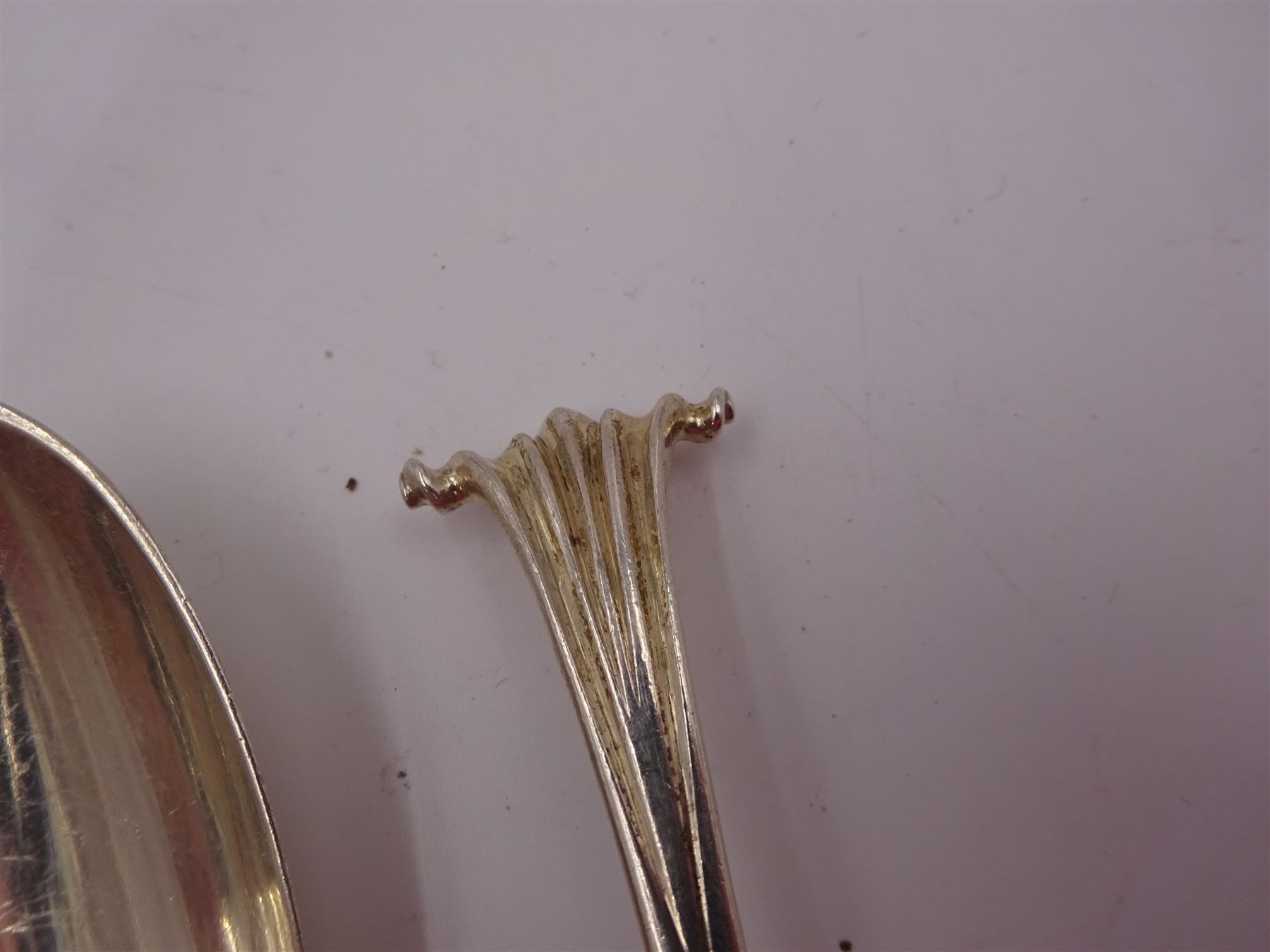 Two George IV Scottish silver Kings pattern toddy ladles, one example slightly larger than the other, both hallmarked Robert Gray & Son, Glasgow 1830 & 1831, together with a set of three Victorian Scottish silver dessert spoons, each with scroll top handles, hallmarked Edinburgh 1897 and 1899, no maker's mark