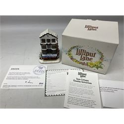 Five Lilliput Lane Illuminated Cottages, comprising Christmas is Coming, with box and deed, Christmas at Mol's, with box and deed, Christmas in Canterbury, with box and deed, Christmas Lights at Sweet Delights and The Three Kings, with box and deeds, together with twelve other Lilliput lanes, to include The First Noel, with box and deed, Winters Moonlight, Yuletide treats, with box and deed etc (17)