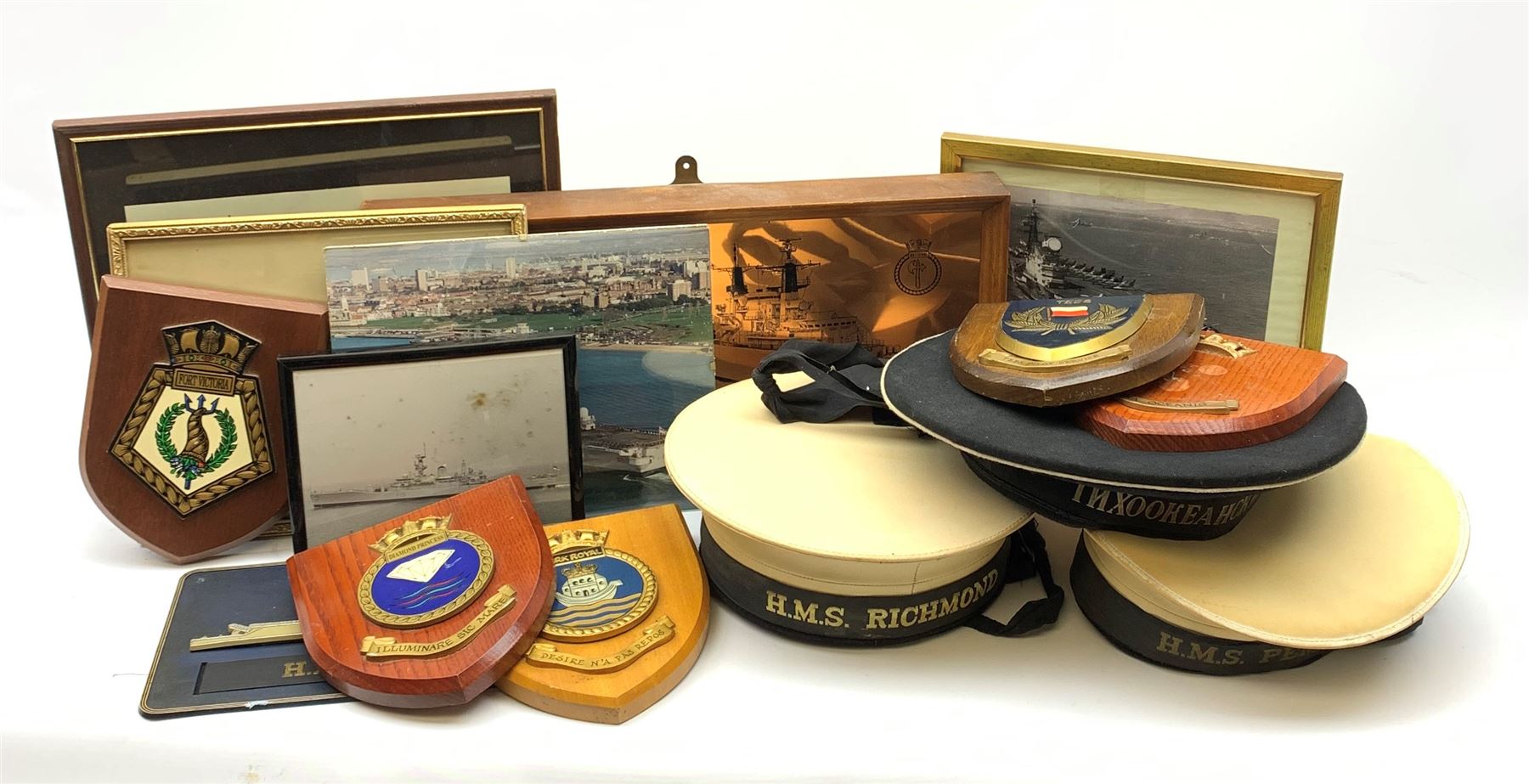 Items of Maritime or Naval interest including two naval hats, one with 'H.M.S. Richmond' tally, the other with 'H.M.S. Pembroke' tally, framed prints etc