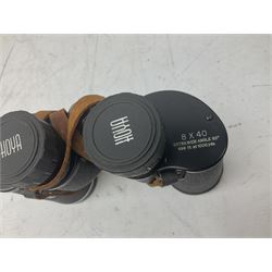 Nine cased pairs of binoculars to include Lieberman & Gortz 12x50, Frank Nipole 8x56, Uniscope, Hoya mark II 8x40, Porst 8x56 etc