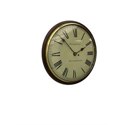 A 19th century eight-day mahogany single train fusee wall clock with a 14” dial and 17” mahogany bezel, cream painted dial with Roman numerals, minute track and steel spade hands, retailed by “Armstrong, Manchester” with a convex glass and a cast brass bezel, case with side door and pendulum regulation door. The Armstrong family were Manchester retailers of both English and imported clocks during the mid to late 19th century. 
With pendulum.



