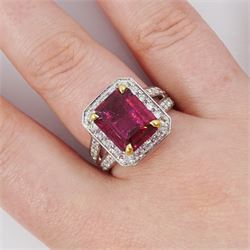 18ct white gold rubellite tourmaline and diamond cluster ring, single octagonal cut tourmaline of 4.05 carat, four claw set in yellow gold, surrounded by  round brilliant cut diamonds, with split diamond set shoulders, London 2013, total diamond weight 1.24 carat