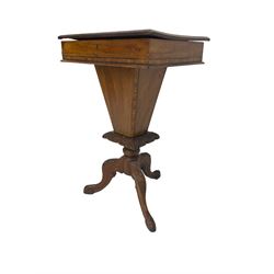 Victorian walnut work table, the rectangular hinged top inlaid with a chessboard design, canted edge with alternating ebony and satinwood inlays, concealing fitted interior, banded and strung frieze over tapering column well, collar carved with foliate decoration, on a cabriole tripod base