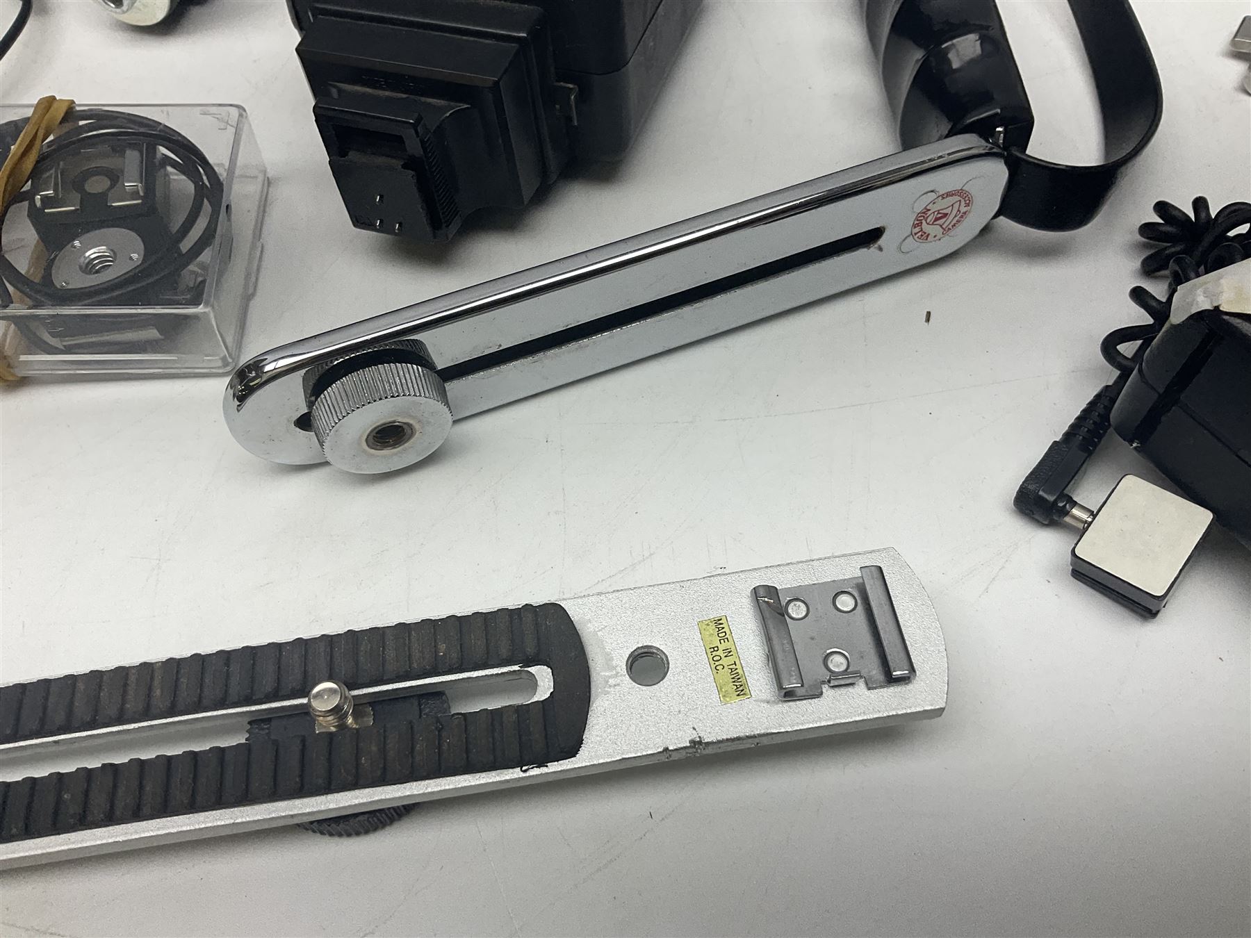 Yukon rubber armoured compact variable power spotting scope (boxed), together with Bresser 10x50 binoculars, Bushnell Excursion 10x42 binoculars, camera equipment etc  