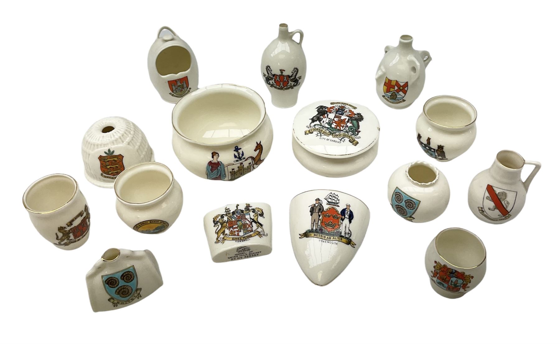 W H Goss crested china to include Guernsey lobster trap, Newcastle-on-Tyne wine flagon, Felixstowe water bottle, Dorchester salt pot etc