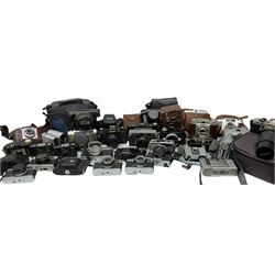 Collection of cameras, to include three Olympus Trip 35,  Balda Super Baldax, Seagull 4A TLR Camera, Pentax MG, Pentax-MV1, Yashica, two Yashica Electro 35, Rollei B35, Fujica 35 EE etc. 