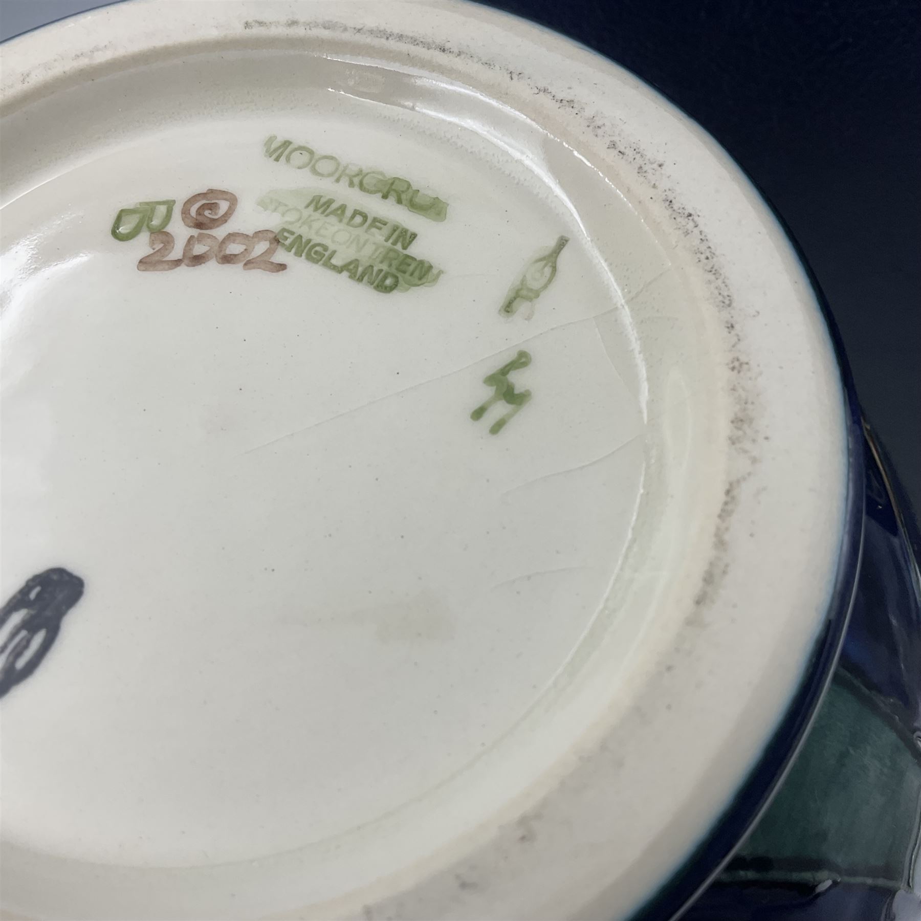 Moorcroft vase, of bottle form, decorated in the Orchid Arabesque pattern by Emma Bossons, circa 2002, H31.5cm, with original box 