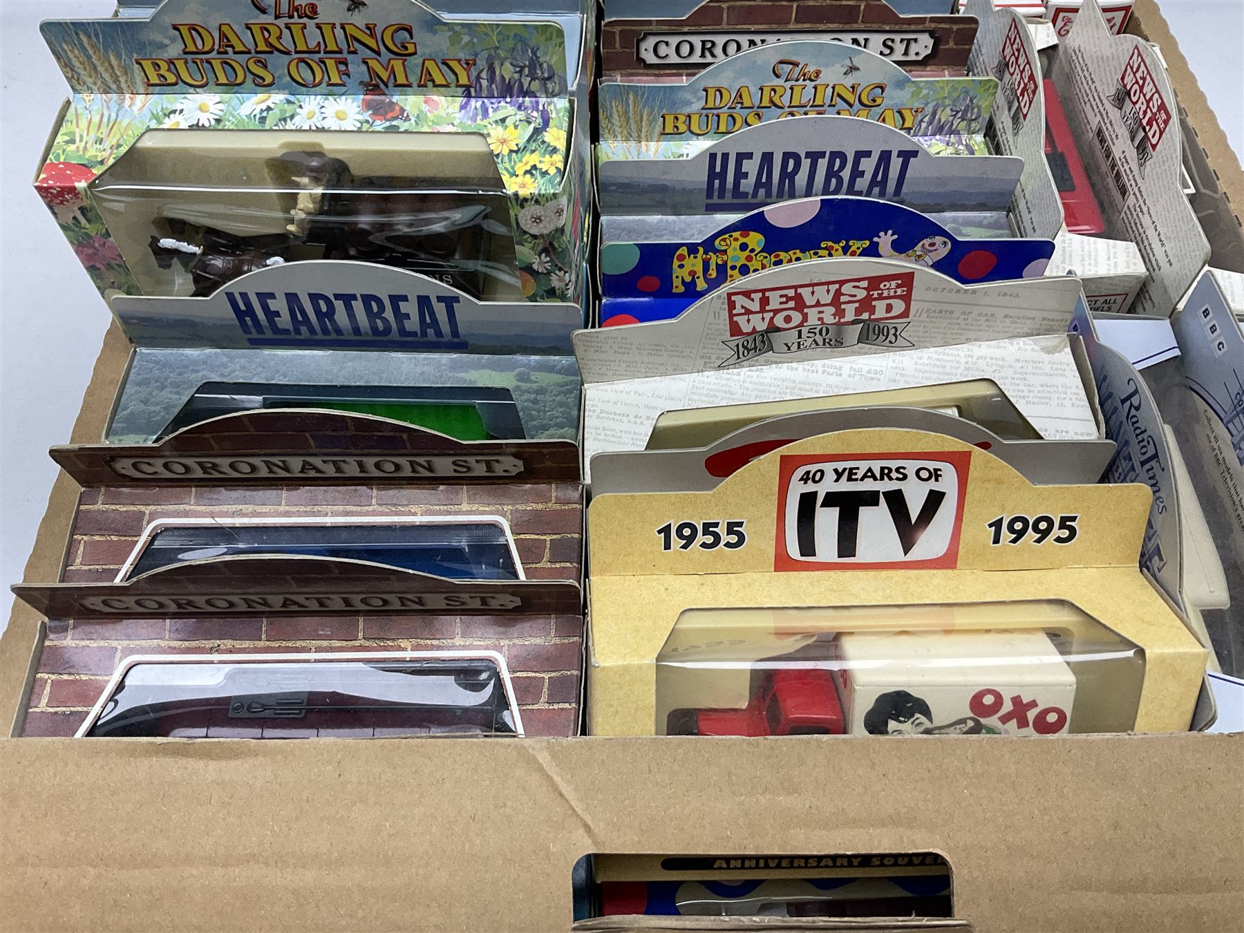 Large collection of Lledo/ Days Gone die-cast models including Antiques Roadshow, Coronation Street, The Darling Birds of May, The Rupert Collection, Heartbeat and others, all boxed (70