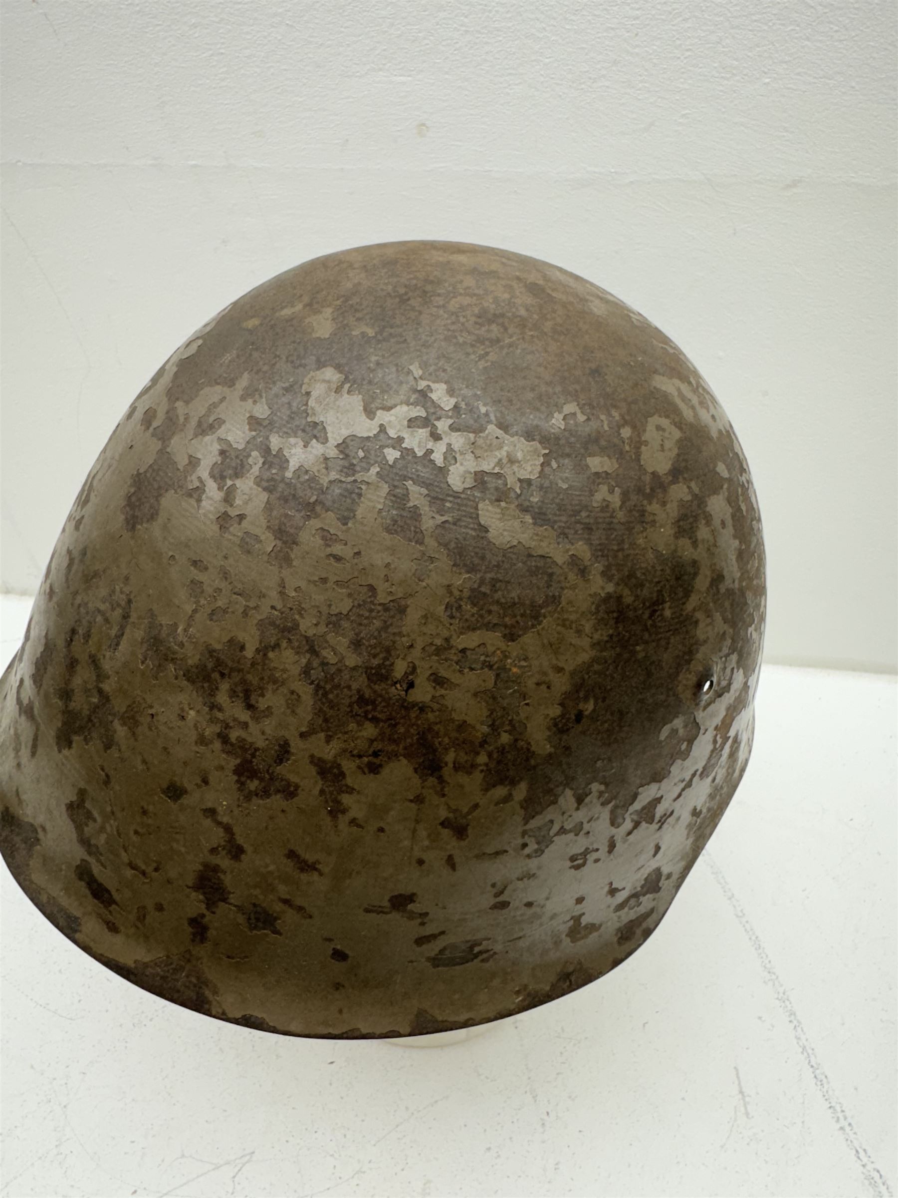 WWII Portuguese steel M1940 combat helmet with original leather liner and strap, D23cm  