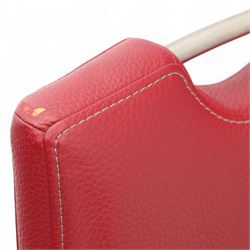 Set of seven contemporary style dining chairs, each with a high padded back and seat upholstered in faux leather on brushed steel sled bases  