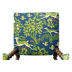 19th century Carolean design oak armchair, upholstered in a vibrant fabric depicting woodland and wildlife scenes, carved lion mask arm terminals, raised on barley twist supports united by H-stretcher