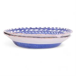Hylton Nel (1941-); Two bowls, 1999, each decorated internally with a figure of a man stood beneath a tree with stylised fish to the top, with makers mark and date to the base HN. 17.5.95