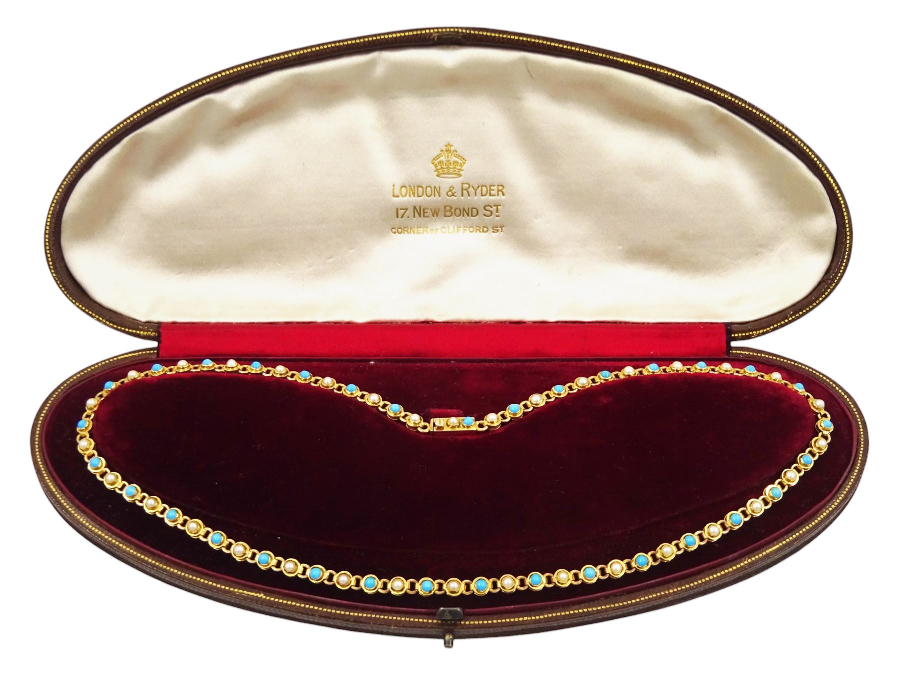 Early 20th century gold split pearl and turquoise necklace, stamped 15ct, in velvet and silk lined box by London & Ryder, New Bond Street
