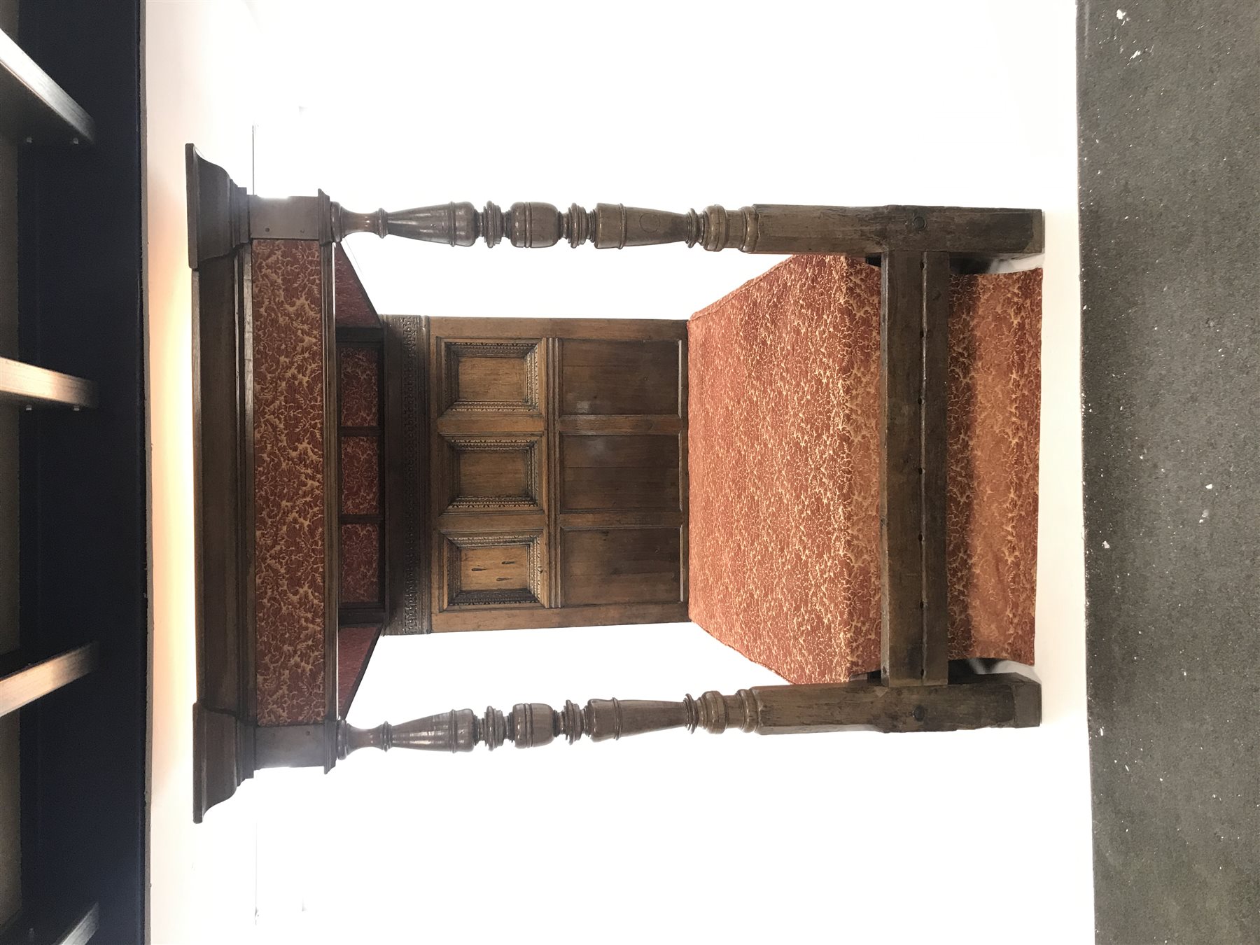 17th century and later Jacobean style oak four poster bed with canopy, the projecting canted cornice above patterned fabric frieze supported by two turned posts, the back with geometric guillouche carved frieze and three deeply recessed panels with egg and dart and other decorative mouldings, W155cm, H217cm, L220cm