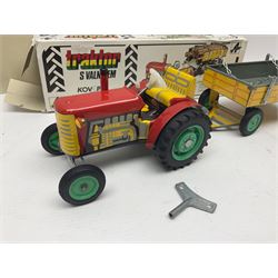 Kovap - eleven tinplate models to include Tractor and Trailer, Road Roller 1927, Moving Moneybox 1924, Hawkeye type B 1924, Boy on a Tricycle; all in original boxes 