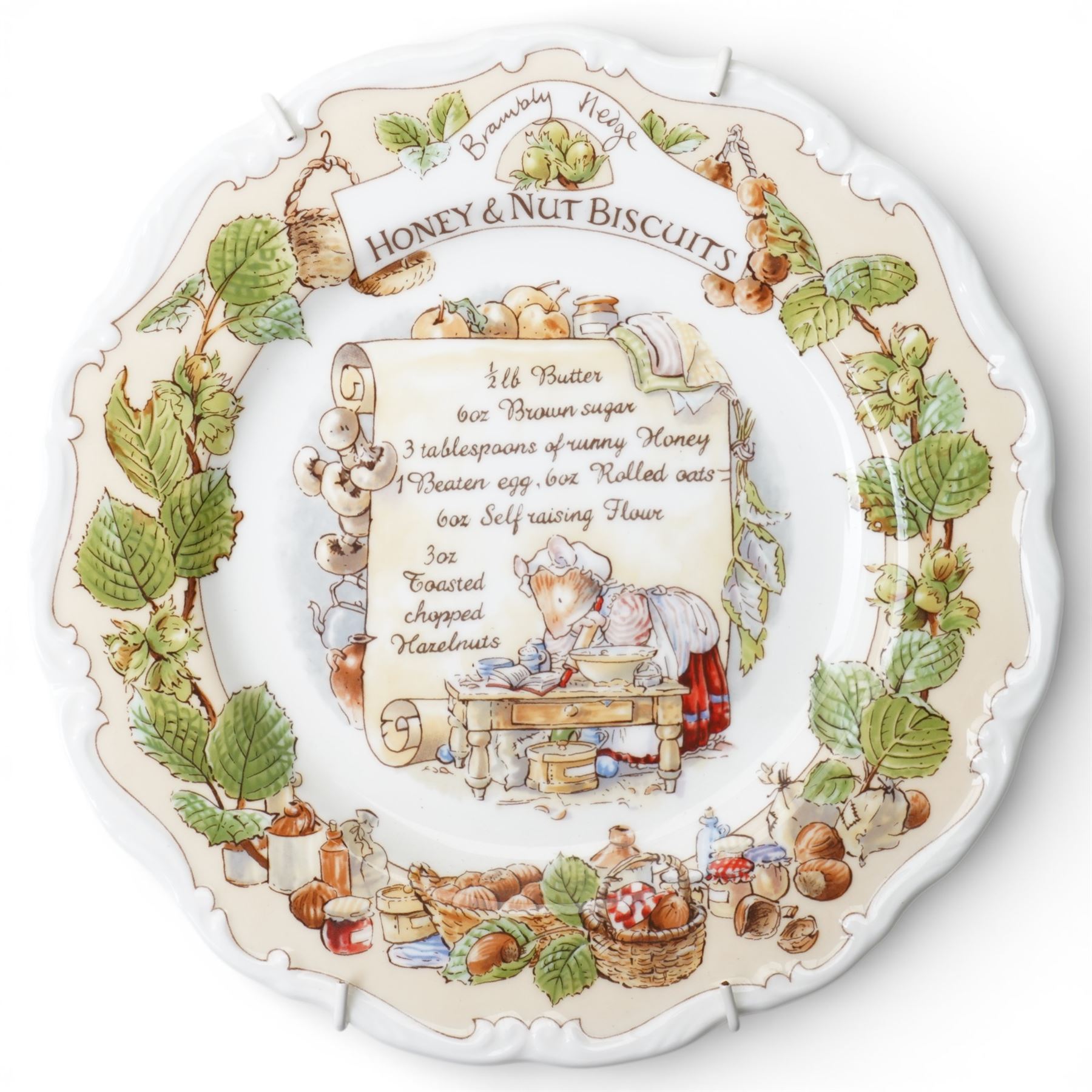 Eight Royal Doulton Brambly Hedge plates from the The Recipe Plate Collection, comprising 'Nettle Soup', 'Strawberry Shortcake', 'Mushroom Tart', 'Apple Pie', 'Elderflower Wine', 'Crystallized Violets', 'Blackberry Sorbet' and 'Honey & Nut Biscuits' (8)