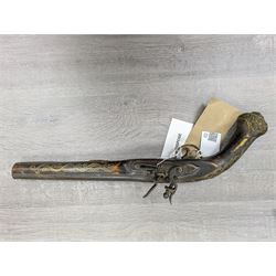REGISTERED FIREARMS DEALERS ONLY - Reproduction flintlock pistol, the full walnut stock with brass filigree inlay and mounts and skull crusher butt L46cm; no visible proof marks - Disposed 25.06.25 - Notified 24.07.25