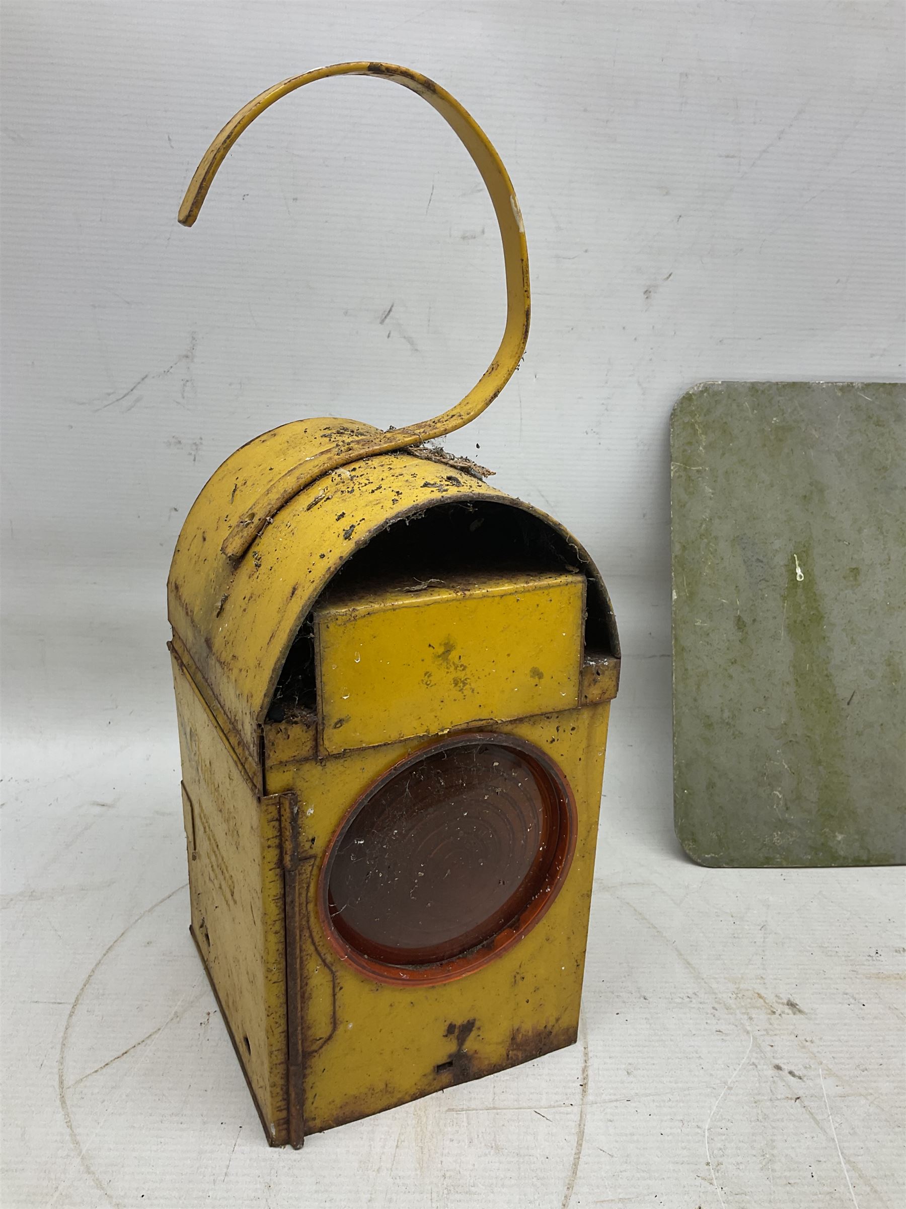 Victorian cast iron railway wagon plate, 'To Carry 10 Tons 4012, Registered by LNER-D 1898', together with a similar mid 20th century example, a smaller cast iron LMS wagon plate, Chalwyn signalling lamp, Give Way to Trains enamel sign and an enamel signal sign