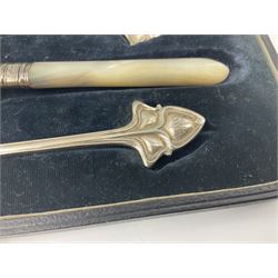 Walker and Hall silver plated Art Nouvea Christening set, comprising knife, fork and spoon, the knife with mother of pearl handle and hallmarked silver ferrule, in fitted case