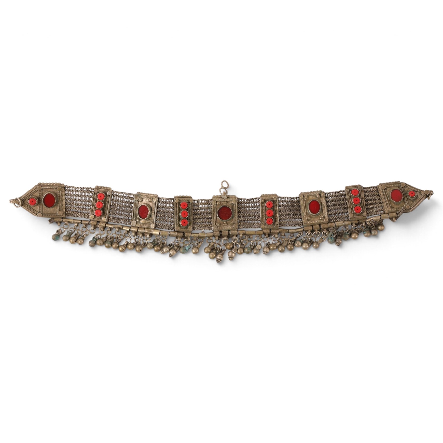 Collection of Middle Eastern jewellery, including silvered multi strand necklace with beadwork and filigree decoration with three cylindrical pendants, pendant necklace with central orange cabochon, beadwork choker and similar  