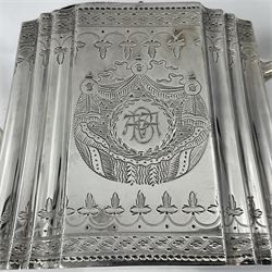 Victorian three-piece silver tea service, comprising teapot, twin handled open sucrier and milk jug, of oval form with shaped rim and C handles, each engraved with crests and bands of strapwork decoration, the milk jug and sucrier with gilt interiors, hallmarked Josiah Williams & Co, Exeter 1881, the teapot with ivory insulators and finial, all contained with a tooled leather, blue silk and velvet lined fitted case, retailed by West & Sun, Dublin 
This item has been registered for sale under Section 10 of the APHA Ivory Act