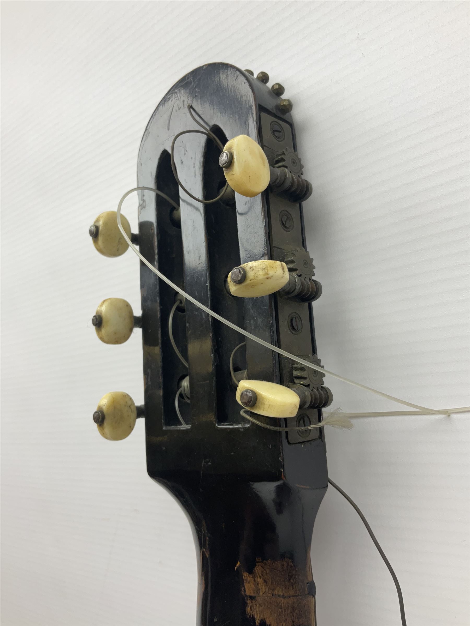 19th century Continental parlour guitar for restoration or display, with maple back and sides,  spruce top, scalloped neck and bone pegs; bears inset plaque to head 'Lapaix Paris 1830' and 'John Eastwood Teacher of the Guitar' paper label with manuscript note 'Fine Old Guitar Restored 1888 by JCB Leeds' L92cm