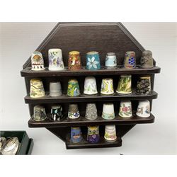 Large collection of thimbles, to include Cloisonné, ceramic, glass and metal examples, together with a display shelf and souvenir spoons 