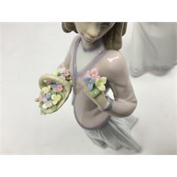 Five Lladro figures, comprising Cookies for Sale no 5191, Christening no 5618, Best Friend no 7620,  Afternoon Promenade no 7636 and Innocence in Bloom no 7644 three with original boxes, largest example H29cm  
