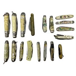 Eighteen pocket knives including example