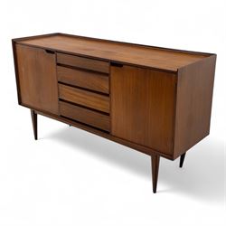 Richard Hornby for Fyne Ladye - mid-20th century afromosia teak sideboard, retailed by Heals of London, rectangular form, with low profile carved gallery lip, above three central drawers with ribbed drawer fronts, flanked by two cupboards with vertically grained doors and recessed pull handles, with streamlined moulded edges and sides, raised on tapered slender legs 